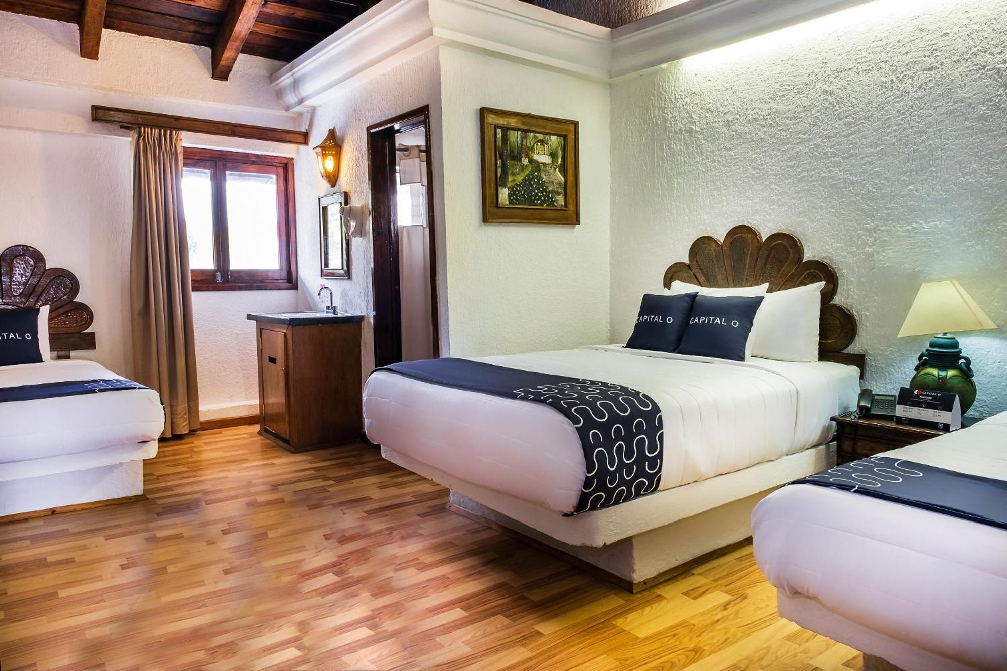 Capital O Hotel Central, คาลาปา ภายนอก รูปภาพ