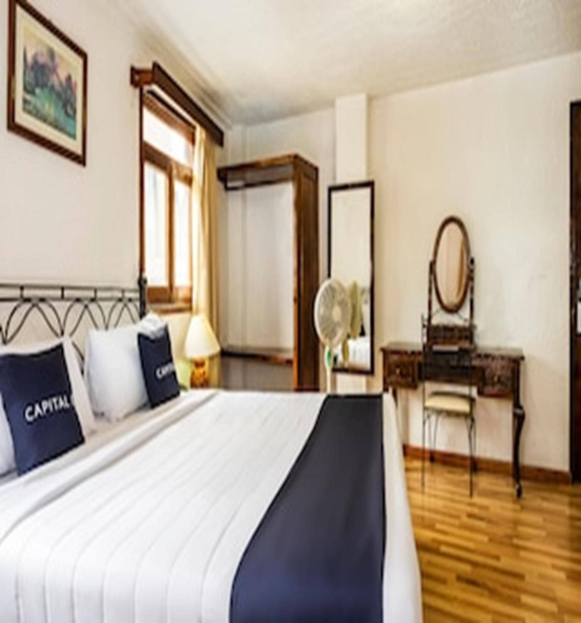 Capital O Hotel Central, คาลาปา ภายนอก รูปภาพ